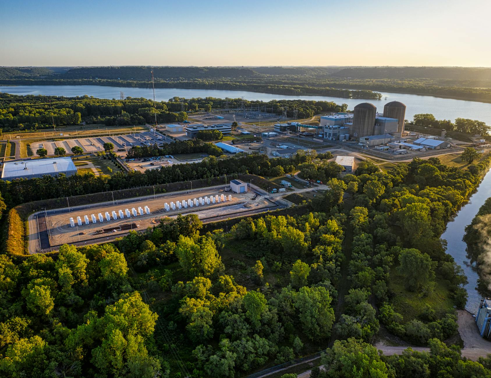 scenic landscape with a factory at sunrise